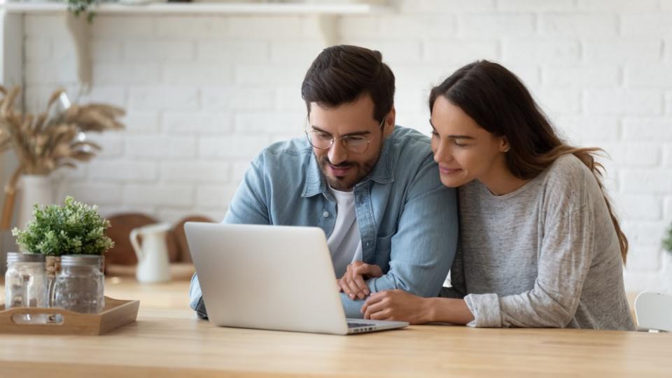 Couple looking at computer